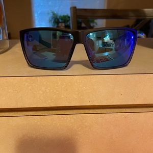 Costas black rim, blue lenses mens sunglasses. Barely worn
